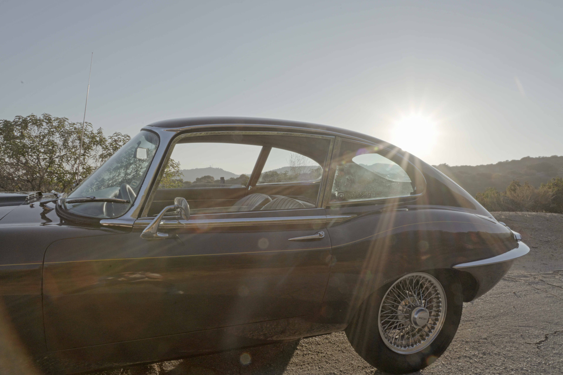 Side profile of the Jaguar E-Type in late afternoon sun